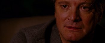 Movie still from “A Single Man” (2009), directed by Tom Ford – A man's face in the dark; Close Up shot, Over the shoulder angle