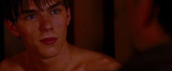 Movie still from “A Single Man” (2009), directed by Tom Ford – A man's chest and chest hair; Close Up shot, Over the shoulder angle