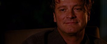 Movie still from “A Single Man” (2009), directed by Tom Ford – A man's face in a dark room; Close Up shot, High angle