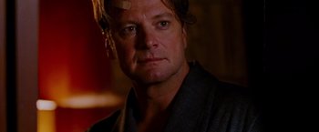 Movie still from “A Single Man” (2009), directed by Tom Ford – A person wearing a robe; Close Up shot, Over the shoulder angle
