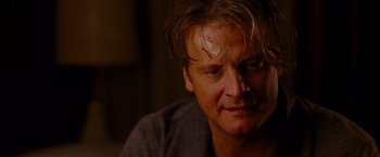 Movie still from “A Single Man” (2009), directed by Tom Ford – A person with a bandage on his head; Close Up shot, Over the shoulder angle
