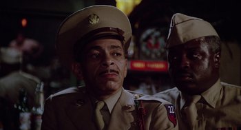 Movie still from “A Soldier's Story” (1984), directed by Norman Jewison – A man in a military uniform is looking at the camera; Close Up shot, Low angle