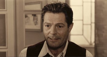 Movie still from “A Special Day” (1977), directed by Ettore Scola – A person wearing a shirt and tie; Close Up shot, Low angle