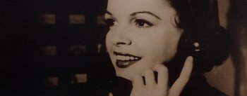 Movie still from “A Star Is Born” (1954), directed by George Cukor – A black - and - white photo of a woman's face; Extreme Close Up shot, High angle