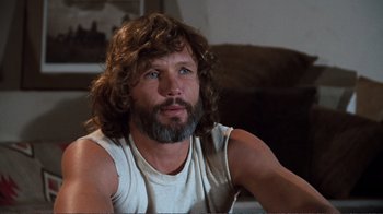 Movie still from “A Star Is Born” (1976), directed by Frank Pierson – A person sitting on a couch; Close Up shot, Over the shoulder angle