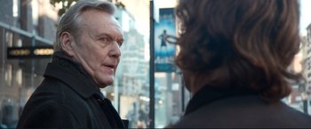 Movie still from “A Street Cat Named Bob” (2016), directed by Roger Spottiswoode – A man and a woman talking in front of a store window; Close Up shot, Over the shoulder angle