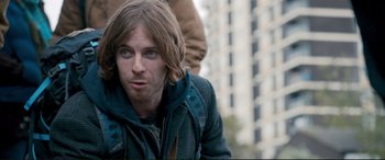 Movie still from “A Street Cat Named Bob” (2016), directed by Roger Spottiswoode – A person with long hair; Close Up shot, Over the shoulder angle