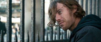 Movie still from “A Street Cat Named Bob” (2016), directed by Roger Spottiswoode – A person with long hair; Close Up shot, Over the shoulder angle