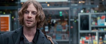 Movie still from “A Street Cat Named Bob” (2016), directed by Roger Spottiswoode – A person with long hair; Close Up shot, Over the shoulder angle