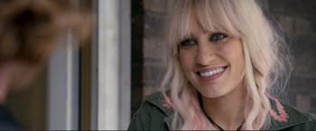 Movie still from “A Street Cat Named Bob” (2016), directed by Roger Spottiswoode – A person with long white hair; Close Up shot, Over the shoulder angle