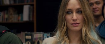 Movie still from “A Street Cat Named Bob” (2016), directed by Roger Spottiswoode – A person with long blonde hair; Close Up shot, Over the shoulder angle