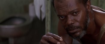 Movie still from “A Time to Kill” (1996), directed by Joel Schumacher – A person with a finger in his mouth; Close Up shot, Low angle