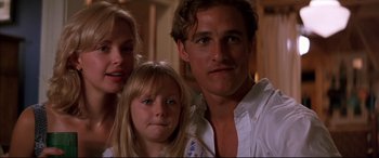 Movie still from “A Time to Kill” (1996), directed by Joel Schumacher – A man and a woman and a little girl; Close Up shot, Low angle