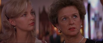 Movie still from “A Time to Kill” (1996), directed by Joel Schumacher – A woman and an older woman looking at each other; Close Up shot, Over the shoulder angle