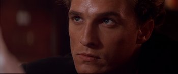 Movie still from “A Time to Kill” (1996), directed by Joel Schumacher – A man's face with blue eyes; Close Up shot, High angle