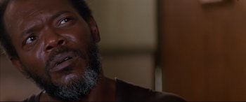 Movie still from “A Time to Kill” (1996), directed by Joel Schumacher – A person with a beard; Close Up shot, Low angle