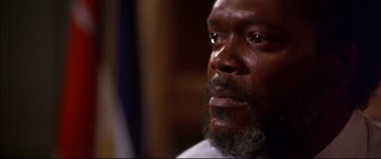 Movie still from “A Time to Kill” (1996), directed by Joel Schumacher – A person with a beard; Close Up shot, Low angle