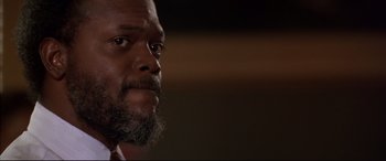 Movie still from “A Time to Kill” (1996), directed by Joel Schumacher – A person with a beard; Close Up shot, Low angle