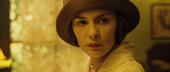 Movie still from “A Very Long Engagement” (2004), directed by Jean-Pierre Jeunet – A person wearing a hat; Close Up shot, Low angle
