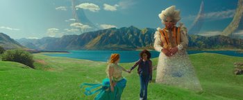 Movie still from “A Wrinkle in Time” (2018), directed by Ava DuVernay – A woman and a child holding hands in front of a mountain; Wide shot, Over the shoulder angle
