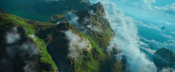 Movie still from “A Wrinkle in Time” (2018), directed by Ava DuVernay – A view of a mountain with clouds rolling over it; Extreme Wide shot, High angle