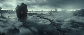Movie still from “A Wrinkle in Time” (2018), directed by Ava DuVernay – A view of a bridge that is in the middle of the clouds; Extreme Wide shot, High angle