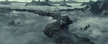 Movie still from “A Wrinkle in Time” (2018), directed by Ava DuVernay – Two people are standing on a bridge in the middle of the sky; Extreme Wide shot, High angle