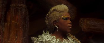 Movie still from “A Wrinkle in Time” (2018), directed by Ava DuVernay – A person wearing a costume; Close Up shot, Low angle