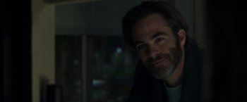 Movie still from “A Wrinkle in Time” (2018), directed by Ava DuVernay – A person smiling at the camera; Close Up shot, Over the shoulder angle