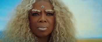 Movie still from “A Wrinkle in Time” (2018), directed by Ava DuVernay – A person with a face painting; Close Up shot, Over the shoulder angle