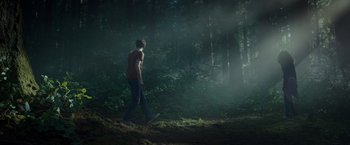 Movie still from “A Wrinkle in Time” (2018), directed by Ava DuVernay – A man walking through the woods on a foggy day; Wide shot, Low angle