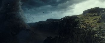 Movie still from “A Wrinkle in Time” (2018), directed by Ava DuVernay – A view of a mountain with a dark sky in the background; Extreme Wide shot, Low angle