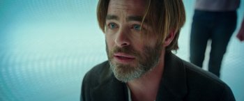 Movie still from “A Wrinkle in Time” (2018), directed by Ava DuVernay – A person with long hair and a beard; Close Up shot, Over the shoulder angle