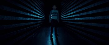 Movie still from “A Wrinkle in Time” (2018), directed by Ava DuVernay – A young boy standing in a dark tunnel; Wide shot, Low angle