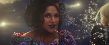 Movie still from “A Wrinkle in Time” (2018), directed by Ava DuVernay – A person wearing a colorful dress; Close Up shot, Over the shoulder angle