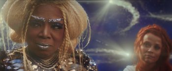 Movie still from “A Wrinkle in Time” (2018), directed by Ava DuVernay – A person with blonde hair; Close Up shot, Over the shoulder angle