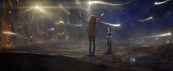 Movie still from “A Wrinkle in Time” (2018), directed by Ava DuVernay – A woman and a child standing in a field; Wide shot, Overhead angle