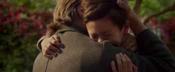 Movie still from “A Wrinkle in Time” (2018), directed by Ava DuVernay – A man and a child hugging each other; Close Up shot, Over the shoulder angle
