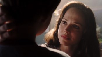 Movie still from “A.I. Artificial Intelligence” (2001), directed by Steven Spielberg – A woman looking at a man in a room; Close Up shot, Over the shoulder angle