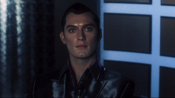 Movie still from “A.I. Artificial Intelligence” (2001), directed by Steven Spielberg – A person wearing a leather jacket; Close Up shot, Low angle