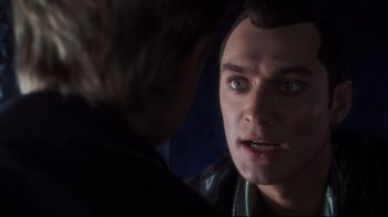 Movie still from “A.I. Artificial Intelligence” (2001), directed by Steven Spielberg – A person looking at another person; Close Up shot, Over the shoulder angle