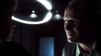 Movie still from “A.I. Artificial Intelligence” (2001), directed by Steven Spielberg – A person looking at the camera; Close Up shot, Low angle