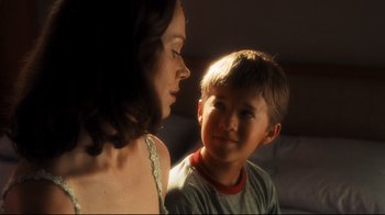 Movie still from “A.I. Artificial Intelligence” (2001), directed by Steven Spielberg – A woman and a boy looking at each other; Close Up shot, Over the shoulder angle