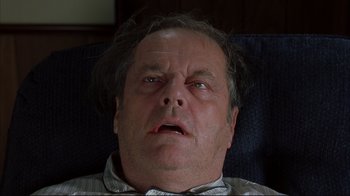 Movie still from “About Schmidt” (2002), directed by Alexander Payne – A person's face with his eyes wide open; Close Up shot, Overhead angle