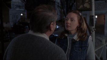 Movie still from “About Schmidt” (2002), directed by Alexander Payne – A man and a woman talking to each other outside; Medium shot, Over the shoulder angle
