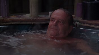 Movie still from “About Schmidt” (2002), directed by Alexander Payne – An older man is relaxing in a hot tub; Close Up shot, High angle