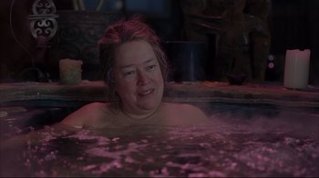 Movie still from “About Schmidt” (2002), directed by Alexander Payne – A woman in a hot tub with pink lights; Close Up shot, High angle