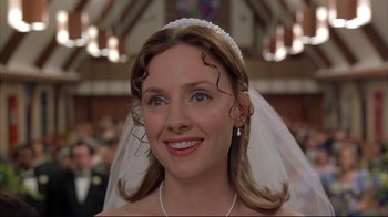Movie still from “About Schmidt” (2002), directed by Alexander Payne – A woman in a wedding dress with a veil; Close Up shot, Low angle