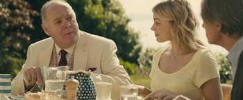 Movie still from “About Time” (2013), directed by Richard Curtis – A man and a woman are sitting at a table; Medium shot, Over the shoulder angle