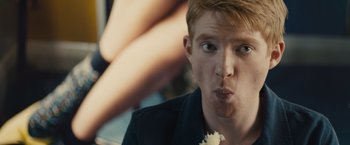 Movie still from “About Time” (2013), directed by Richard Curtis – A person eating food; Close Up shot, Over the shoulder angle